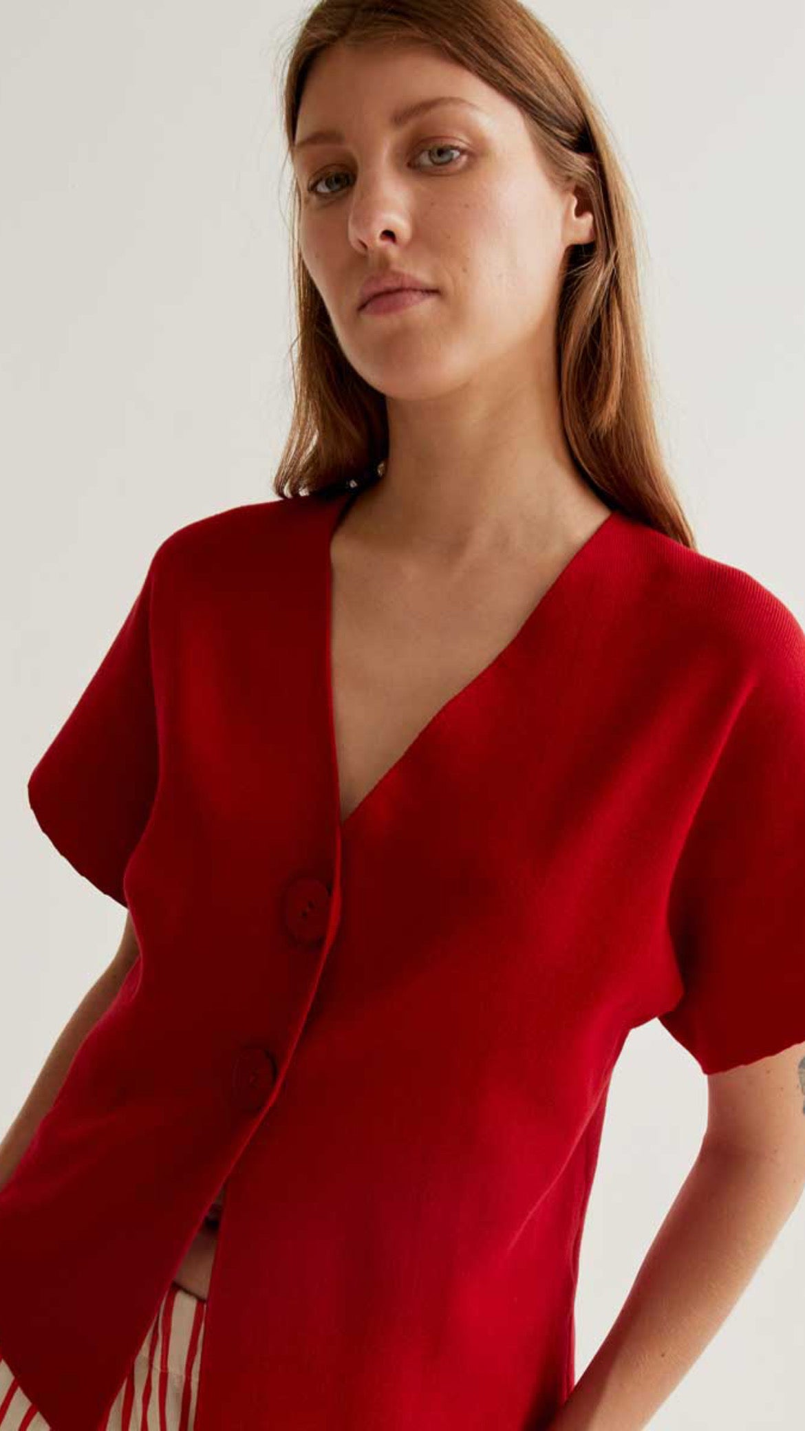 Cárdigan de punto rojo