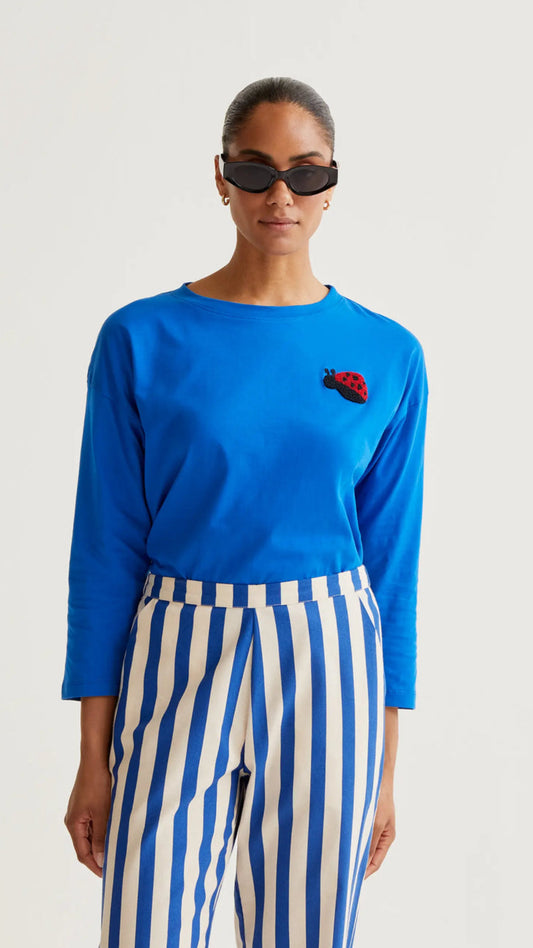 Camiseta azul con bordado Coccinellidae